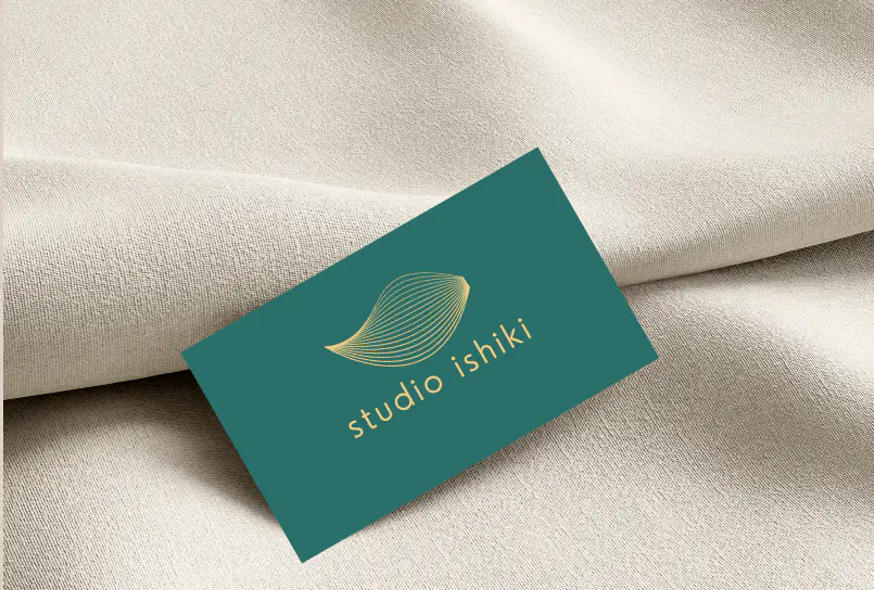 Business card design portfolio project by Yatra Creation for Studio Ishiki – elegant logo design in warm brand colors for conscious businesses